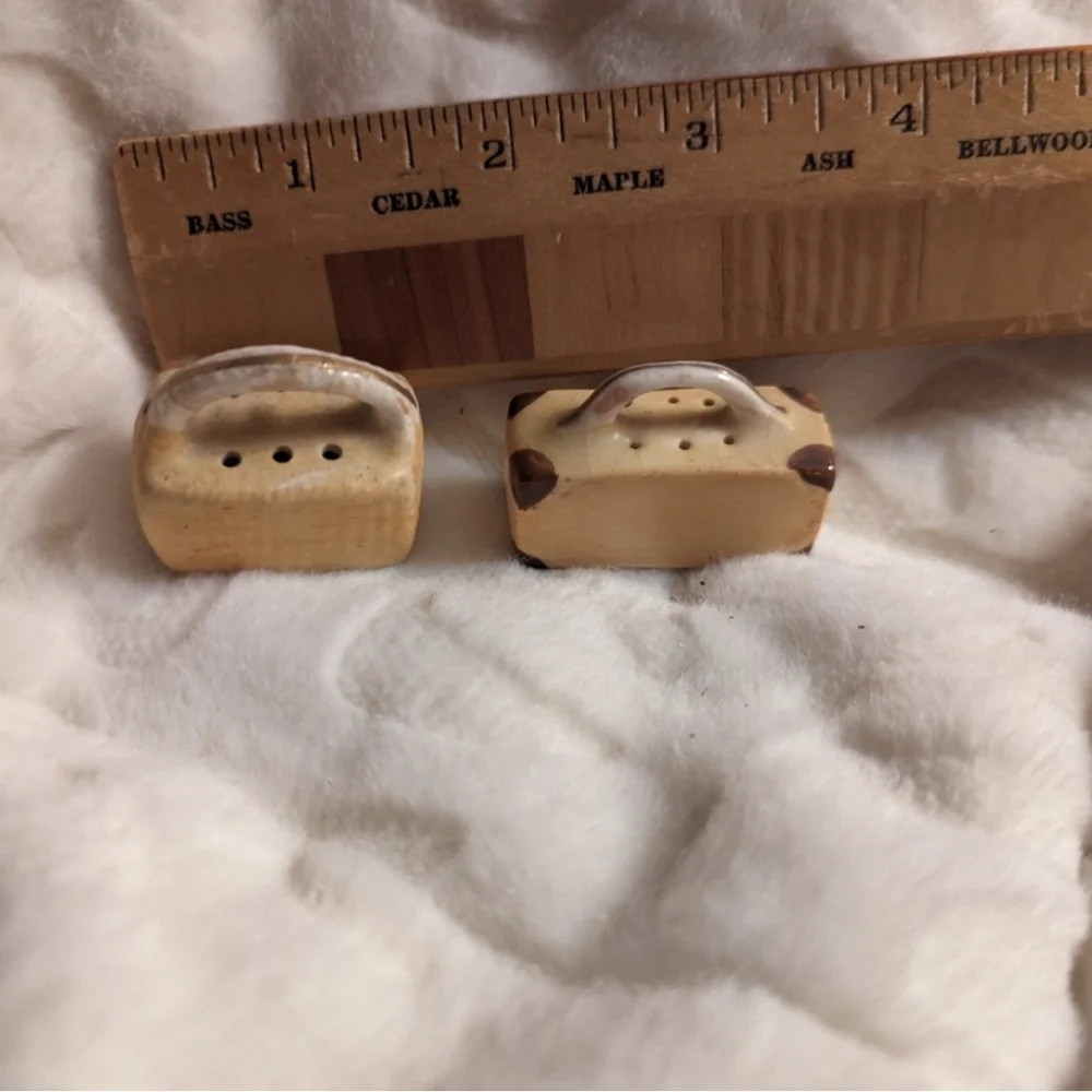 Vintage salt and pepper woman w luggage